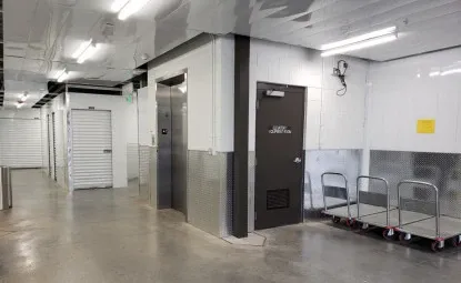 Indoor storage units with moving carts.