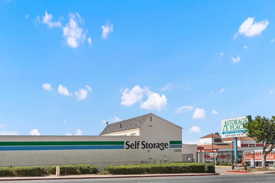 A Storage Place outside of storage facility and sign.