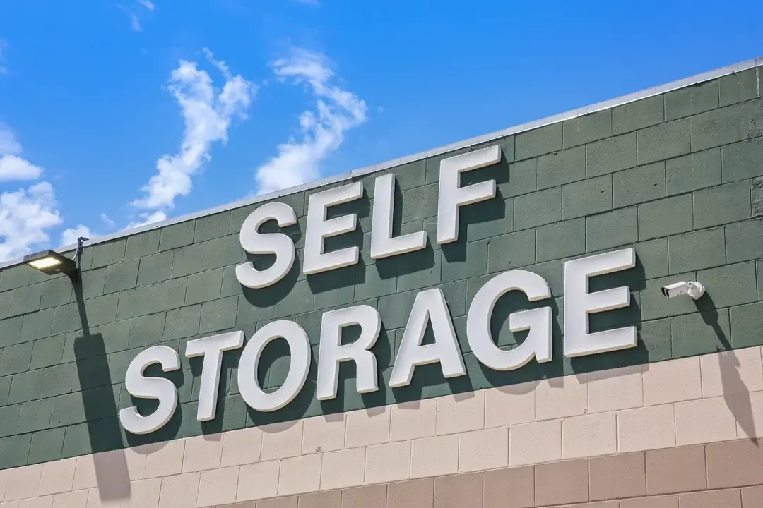 Close up of a white self storage sign.
