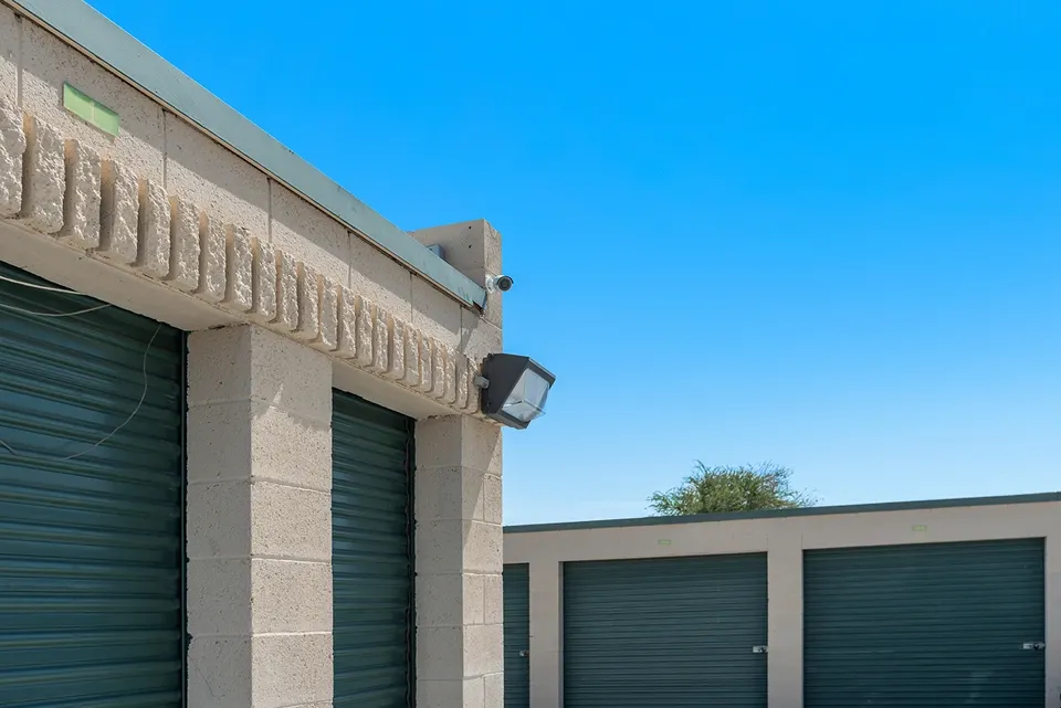 Floodlights on a row of storage units