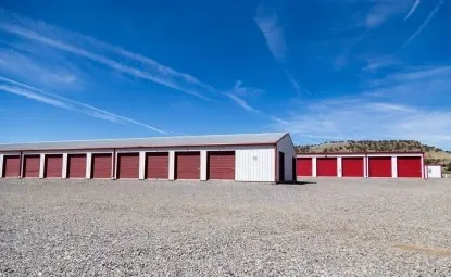 Wide view of outdoor red storage units.