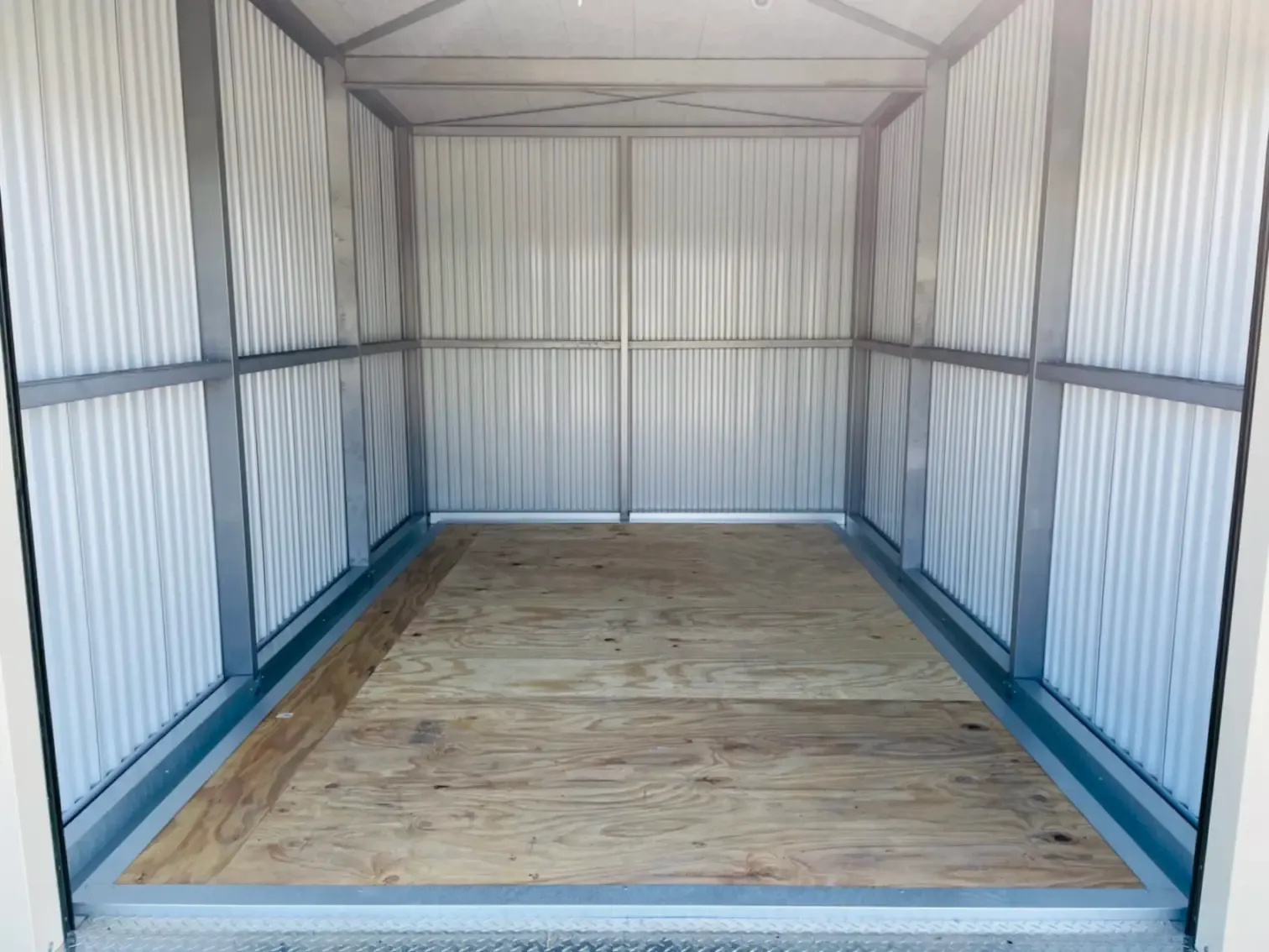 Wood floored storage unit.
