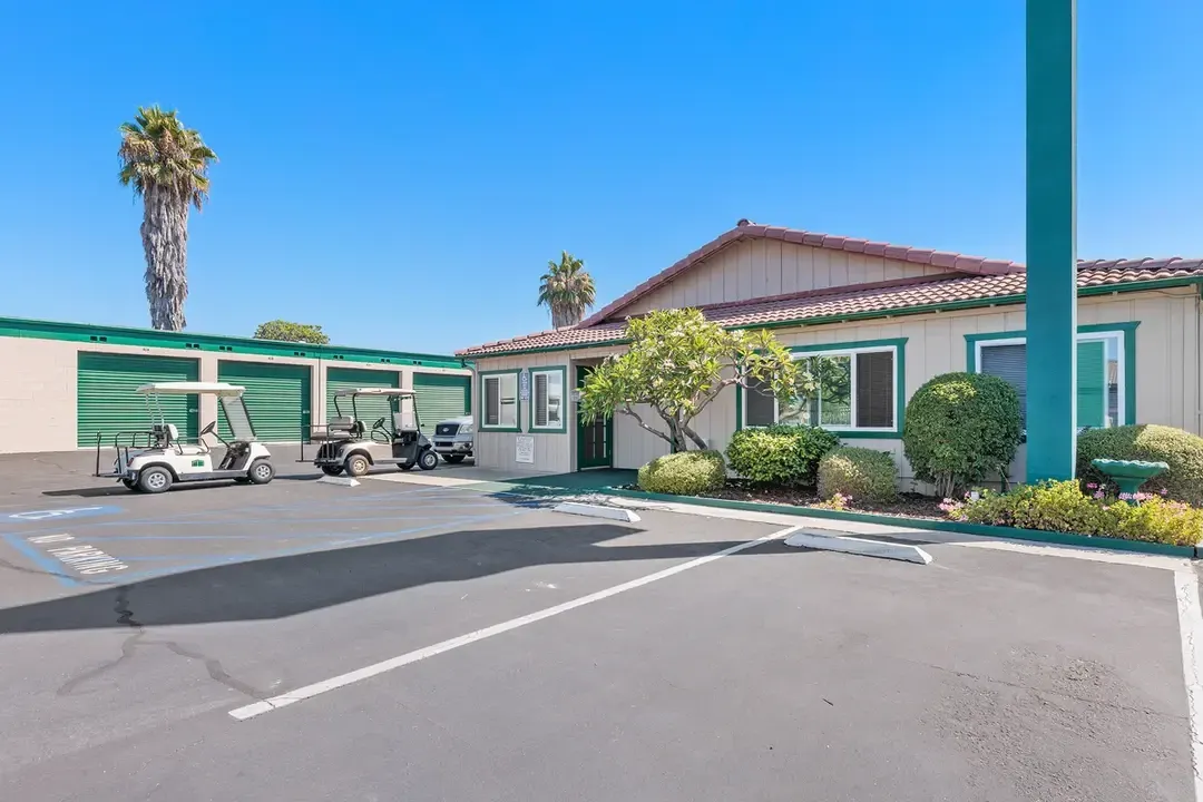 Front offices building with golf carts.