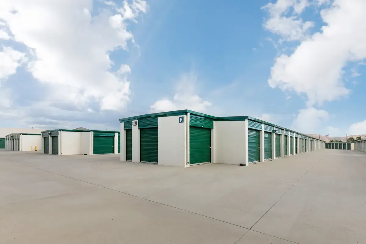 Exterior drive up storage units in a row.