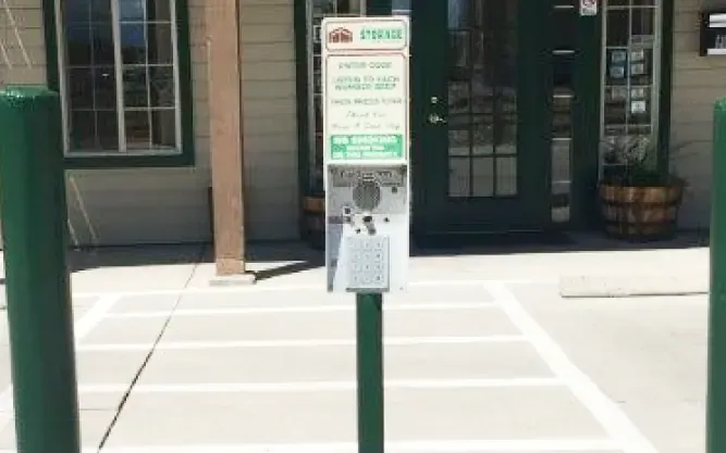 Keypad at an outdoor storage office.