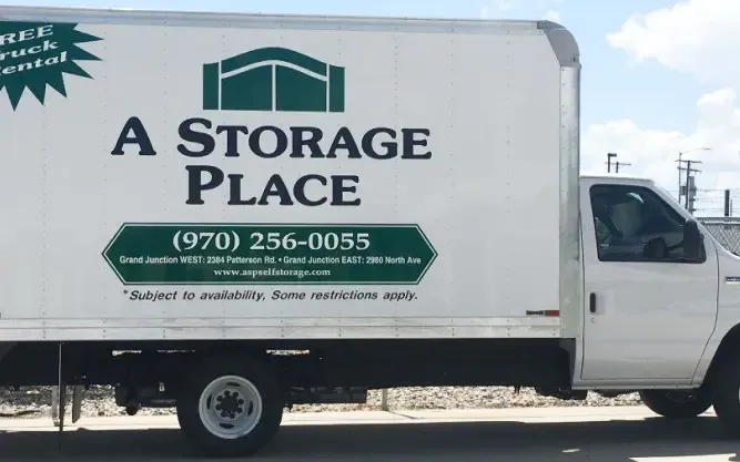 A Storage Place branded moving truck.
